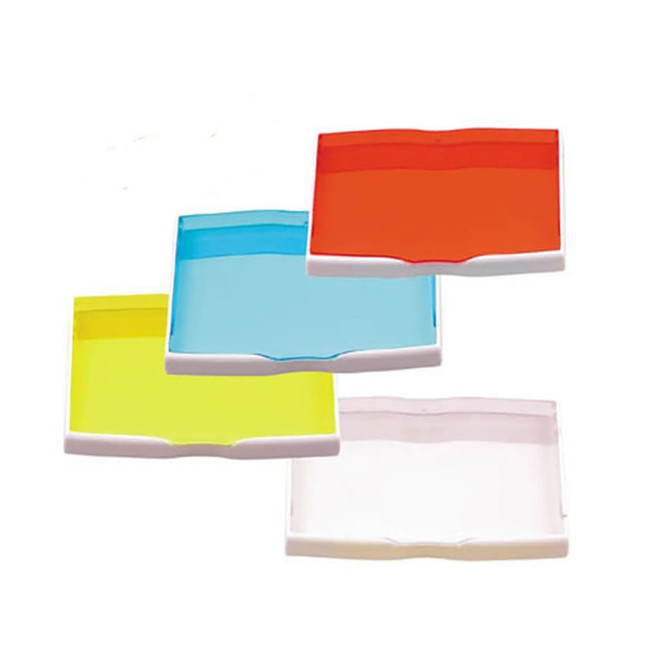 A set of four plastic card holders in blue, red, yellow, and clear with a white base. Each holder has a curved design.