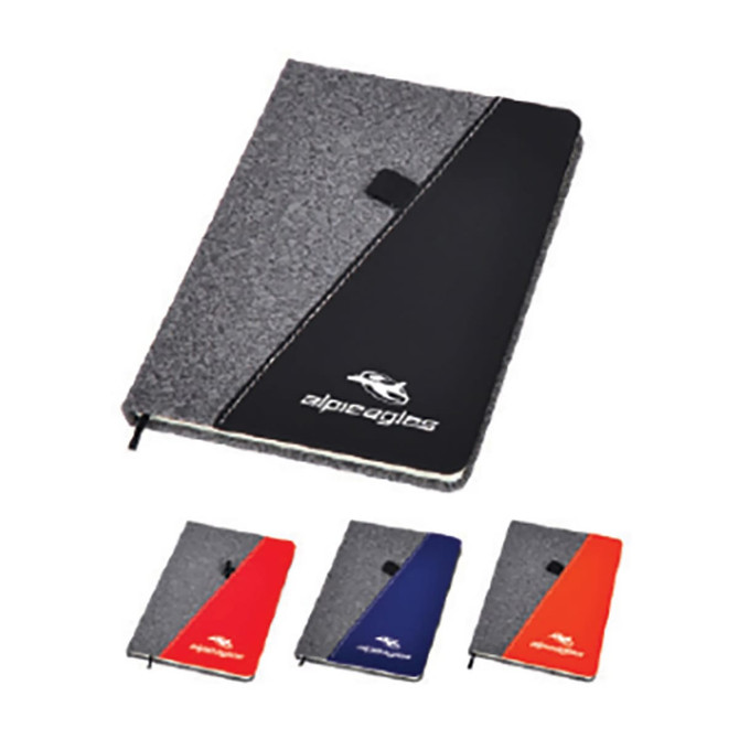 A notebook with a grey cover featuring a black and red design, along with additional notebooks in red and blue.