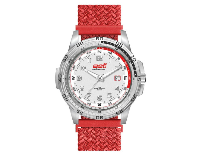 A sports watch with a white dial, silver case, and red nylon strap, featuring a logo on the face.