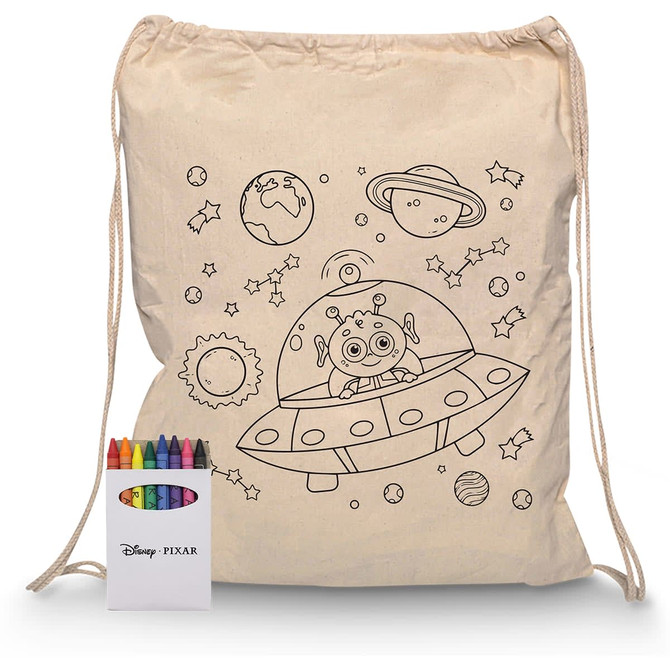 A cream drawstring bag featuring a playful space-themed design, accompanied by a crayon set in various colours.