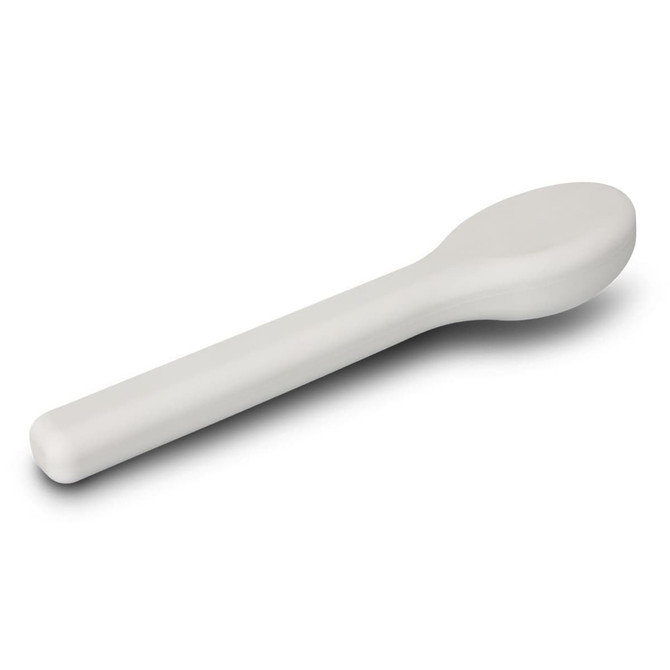A light grey travel spoon from a travel cutlery set, featuring a smooth, ergonomic design.