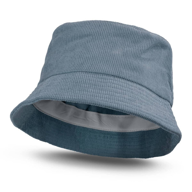 A blue corduroy bucket hat with a wide brim, featuring a lined interior and a subtle logo design.