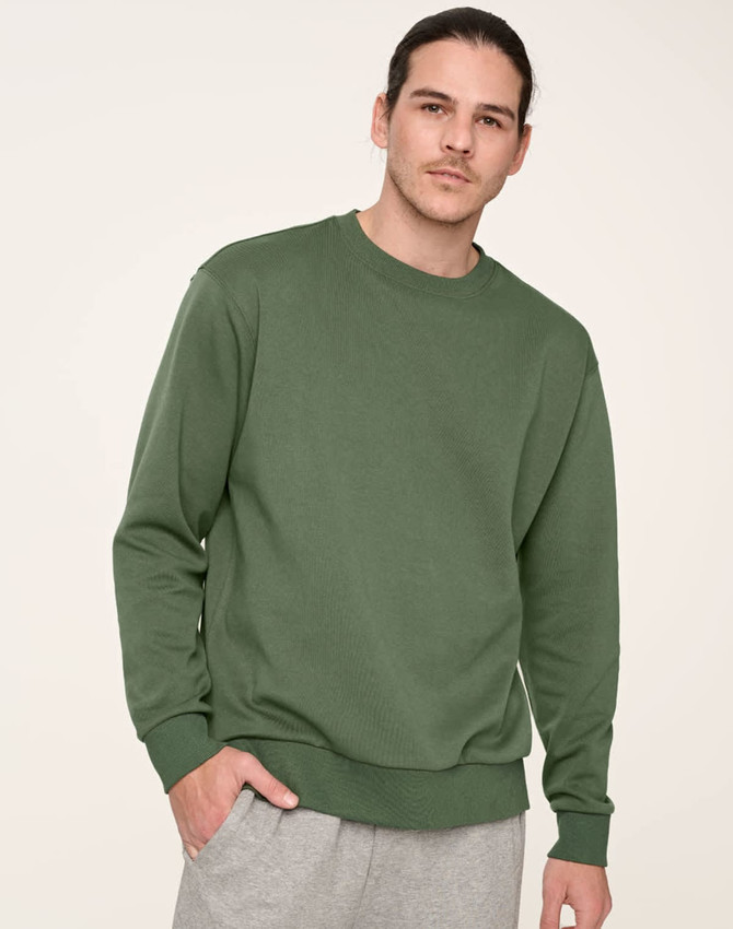 A unisex crew neck sweater in a green shade, featuring a relaxed fit and a logo on the front.