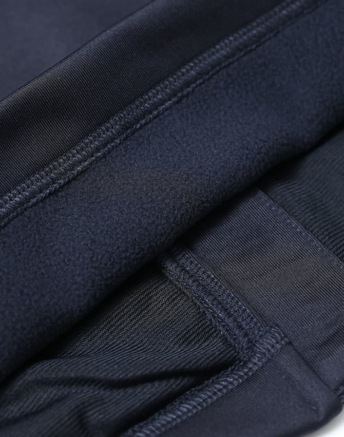 A navy blue men's sustainable softshell jacket featuring smooth fabric and a soft inner lining. The jacket includes a logo.