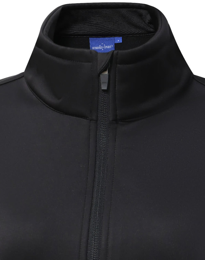 A black softshell jacket with a high collar and a zipper, featuring a logo.