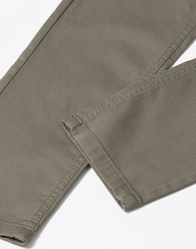 Men's flexi chino pants in a muted grey tone with a clean, modern design and visible stitching details.