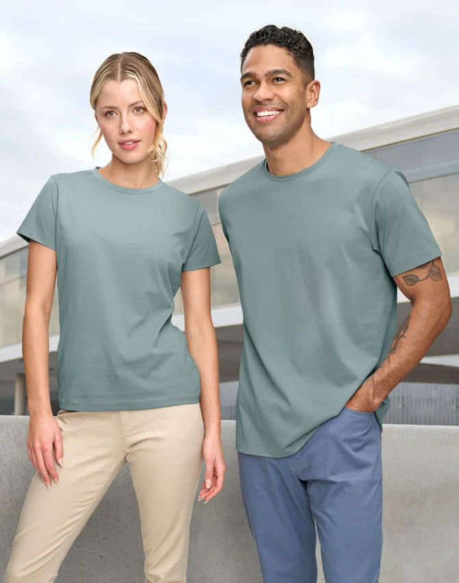 A men's and women's premium cotton short sleeve tee shirt in a soft green colour, featuring a logo.