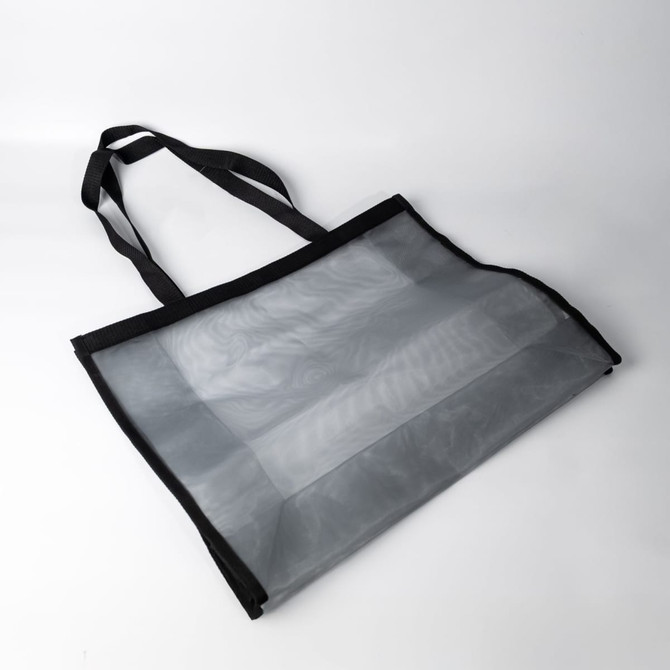 A grey nylon mesh tote bag with black straps and a simple design, featuring a logo.