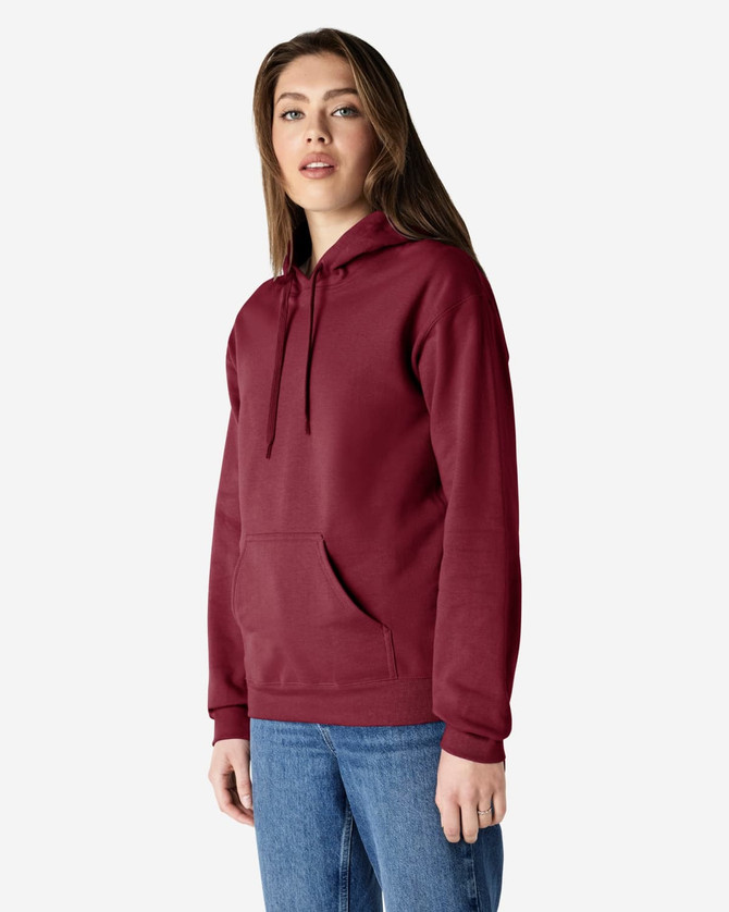 A burgundy adult hooded sweatshirt, featuring a front pocket and a drawstring hood. The model stands casually.