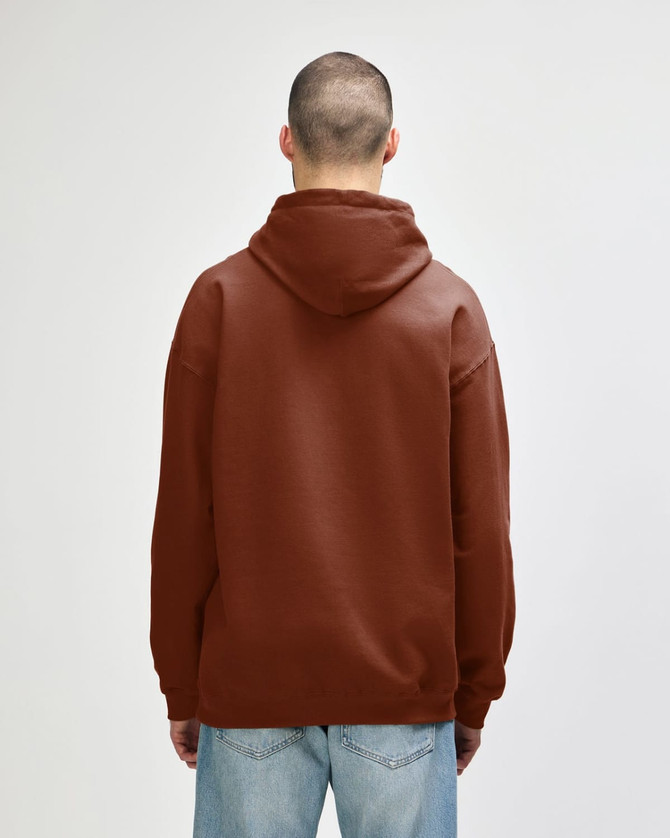 A brown hooded sweatshirt featuring a spacious hood and a relaxed fit, with an unseen logo on the back.