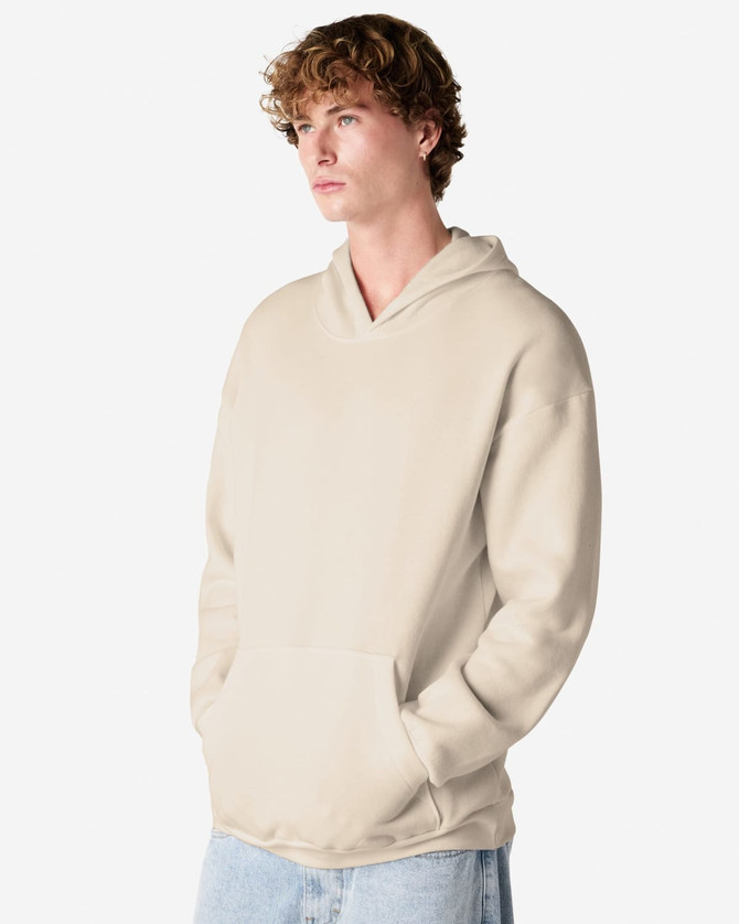 A unisex hooded sweatshirt in beige featuring a front pocket and a logo on the chest.