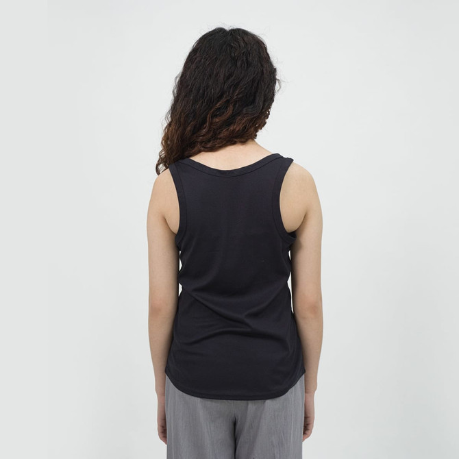 A women's sports tank top in black, featuring a simple sleeveless design and a smooth back.