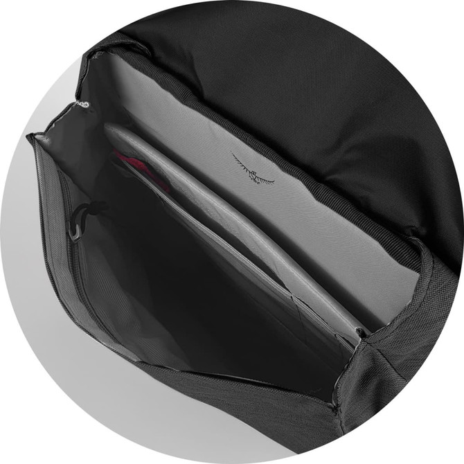 A black backpack interior featuring multiple pockets and a padded compartment for devices. It has a logo.