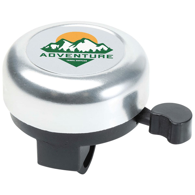 A silver bicycle bell with a black lever and a circular logo featuring mountains and the word "ADVENTURE".