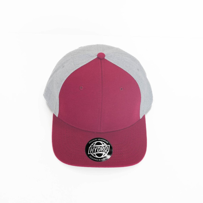 A maroon and grey cap featuring a circular logo on the front and a flat brim.