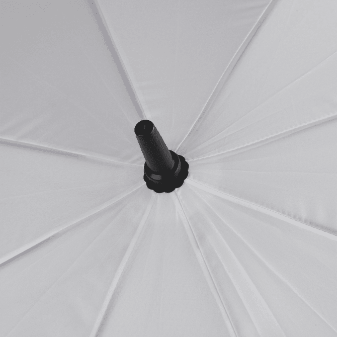 A white golf umbrella viewed from above, featuring a central black shaft and multiple panels. It has a branding logo.