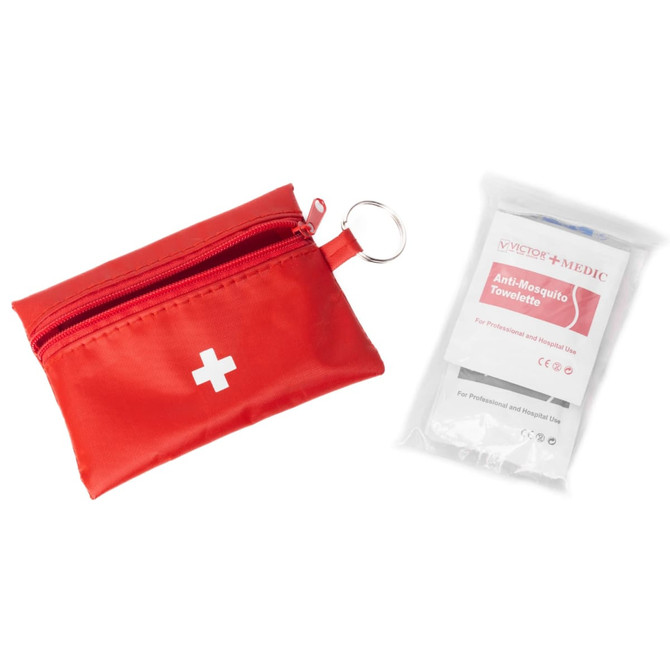 A red first aid travel kit with a zipper and keyring, accompanied by a package of anti-mosquito towelettes.
