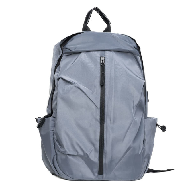 A grey backpack with a front zip pocket and side compartments, featuring a logo on the front.