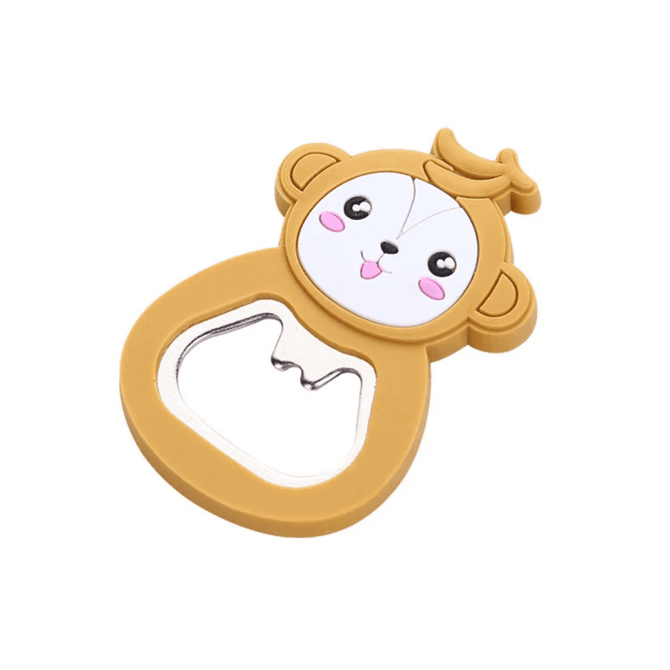 A drink bottle opener shaped like a brown monkey with a smiling face and a shiny bottle opening section.