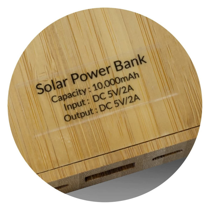 A bamboo solar power bank with a capacity of 10,000mAh and input/output specifications presented.