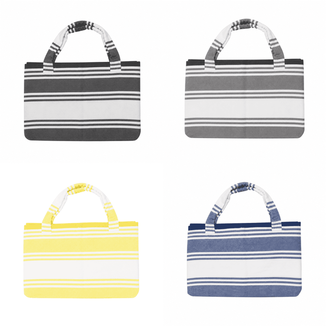 A collection of foldable beach towel bags in black, white, yellow, and navy blue, featuring striped designs and handles.