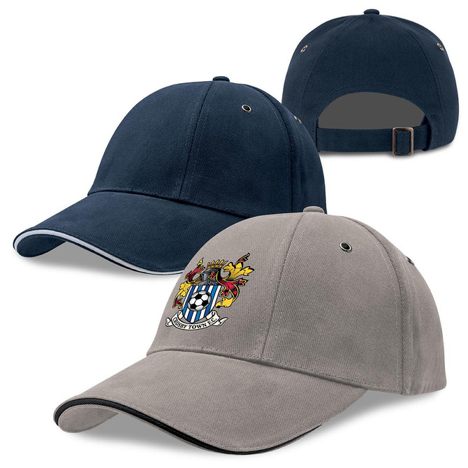 A grey and navy cap with a logo, featuring a curved brim and adjustable strap at the back.
