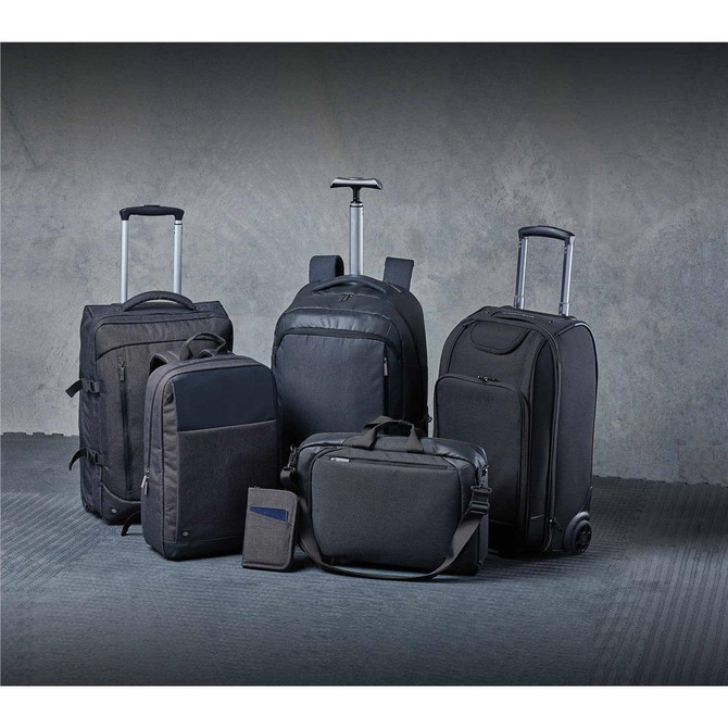 A collection of black bags, including backpacks, a wheeled suitcase, and a messenger bag, with a sleek design.