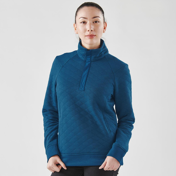 A teal women's thermal pullover with a 1/4 zip and a quilted pattern, featuring a logo on the front.