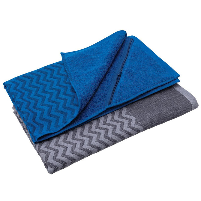 A blue gym towel with a pocket, layered over a grey and patterned towel. The design features a chevron pattern.