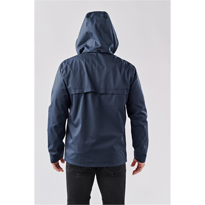 A navy blue lightweight shell jacket with a hood, featuring a back flap and a logo.