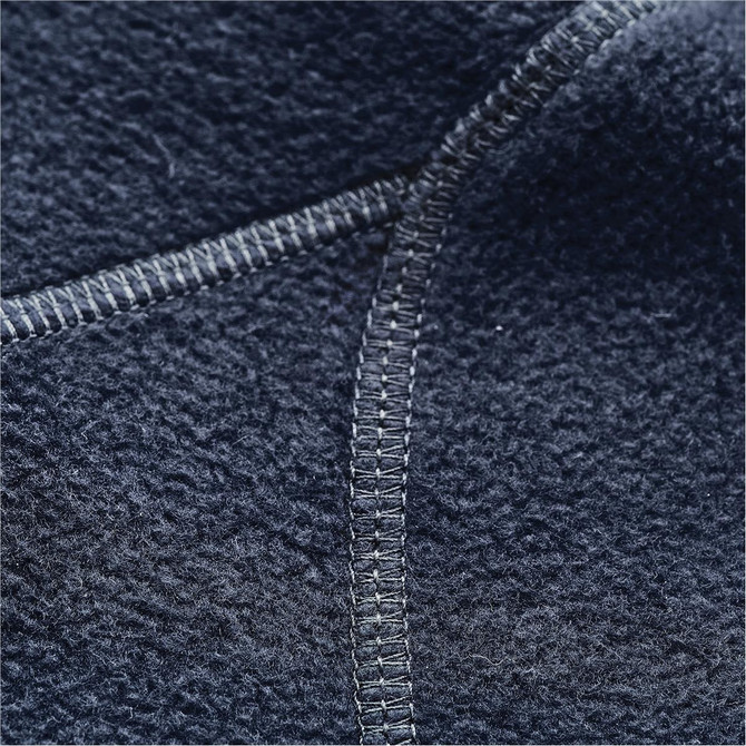 A close-up of a navy blue polar fleece jacket showcasing the textured fabric and detailed stitching.