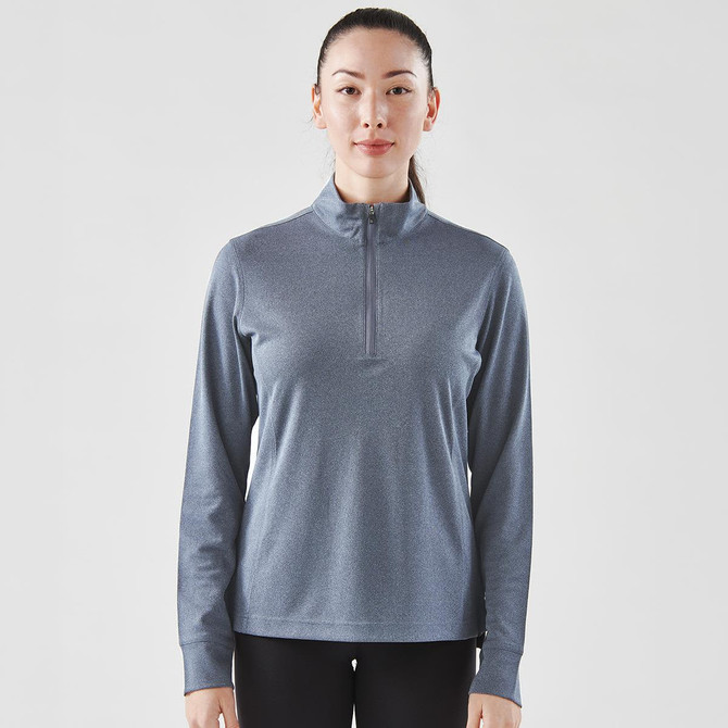 A women's 1/4 zip pullover in blue, featuring long sleeves and a high collar, with visible branding.