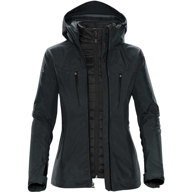 A women's jacket in dark green with a hood and zippered pockets, featuring a logo on the sleeve.