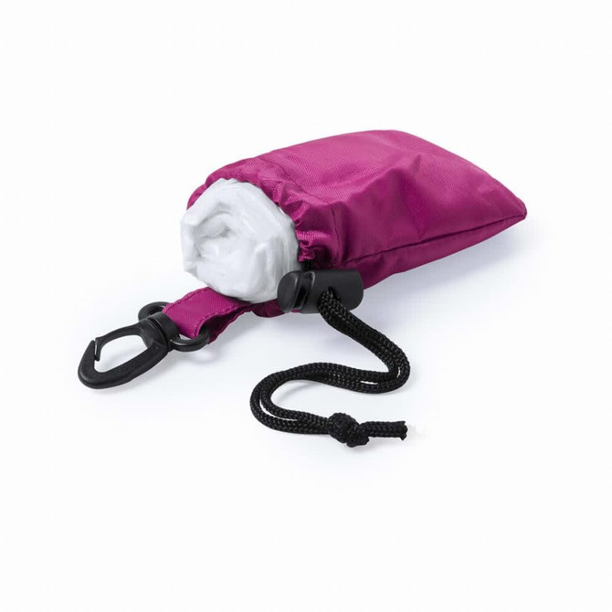 A compact magenta poncho packed neatly in a pouch with a clip and drawstring for easy storage.
