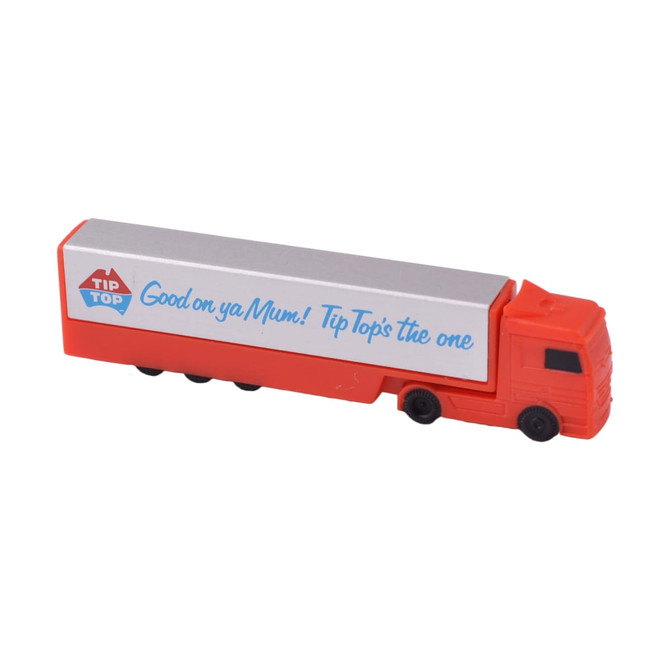 A red and silver truck-shaped flash drive, featuring a brand logo and a message on the side.