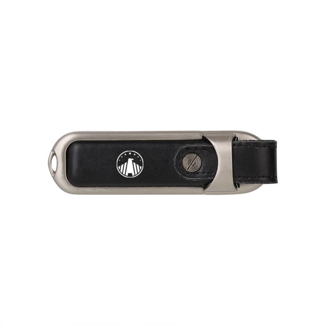 A black Taurus flash drive with a metal casing and a leather strap, featuring a logo on the side.