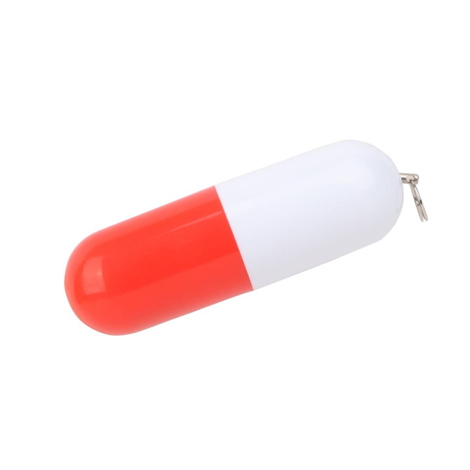 A pill-shaped flash drive in red and white, featuring a keychain attachment. It has a smooth glossy finish.
