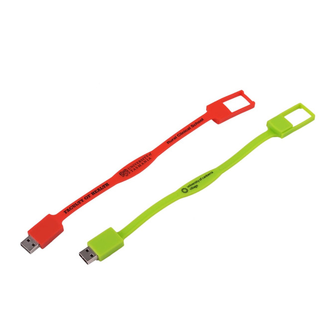 A slim silicone wristband flash drive in red and green, featuring a logo on each band.
