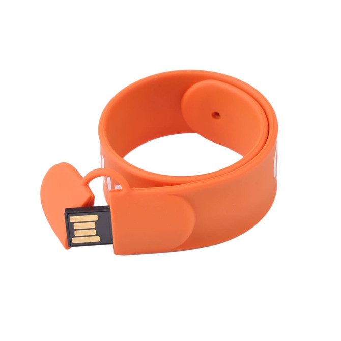 An orange silicone slap band flash drive with a USB connector visible. It features a logo on the surface.
