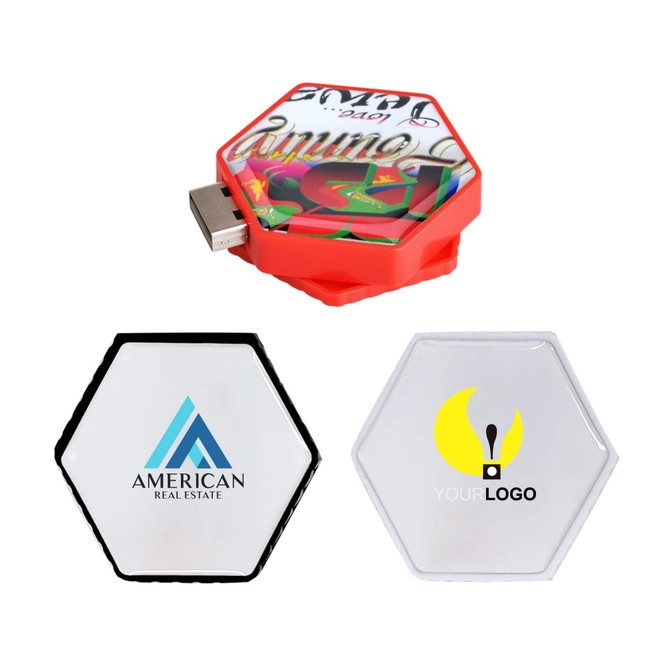 A hexagon-shaped flash drive in red with a colourful design, alongside two white hexagon flash drives featuring logos.