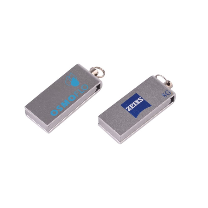 A metallic grey flash drive with a loop for attachment, featuring two distinct logos on its surface.