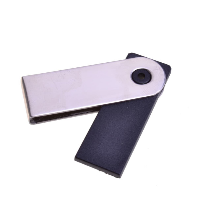 A silver and black Mini Festin flash drive with a sleek design and a circular button.