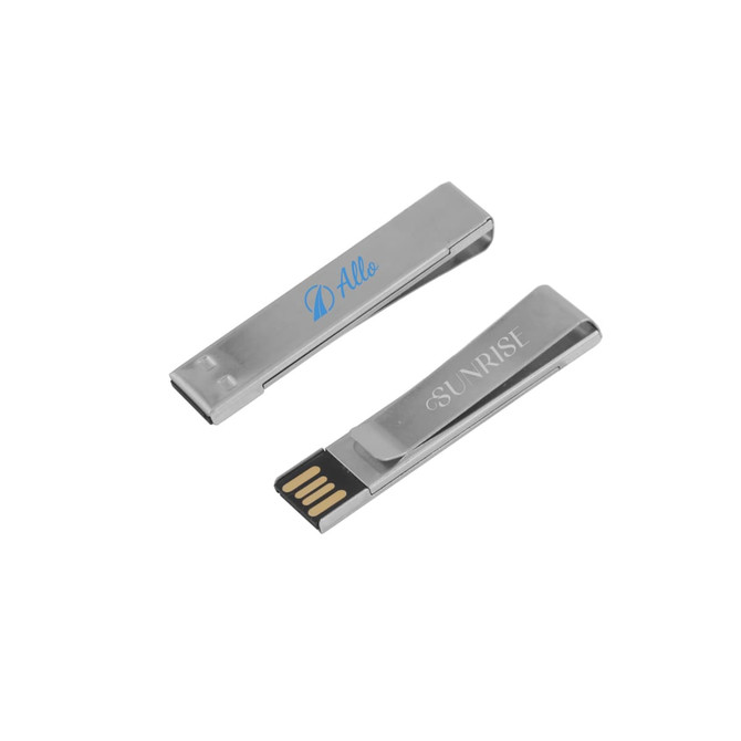 A silver metal clip flash drive with a sleek design, featuring two sides and a built-in USB connector.