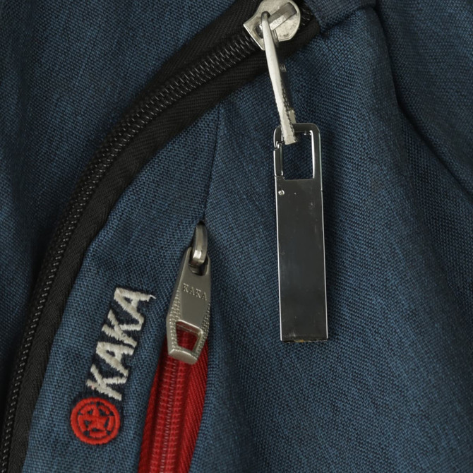 A silver Focus Flash Drive attached to a dark blue fabric with a red zipper and a logo on the material.