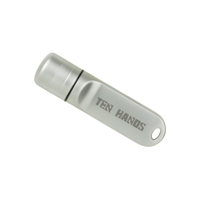 A silver flash drive with a cylindrical shape and a logo on its surface.