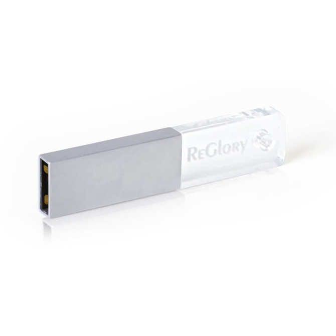 A rectangular crystal flash drive in clear and silver, featuring a logo on one side.