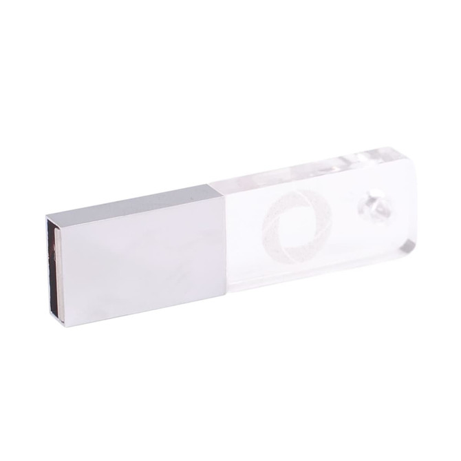 A rectangular crystal flash drive with a metallic end, featuring a logo on the transparent section.