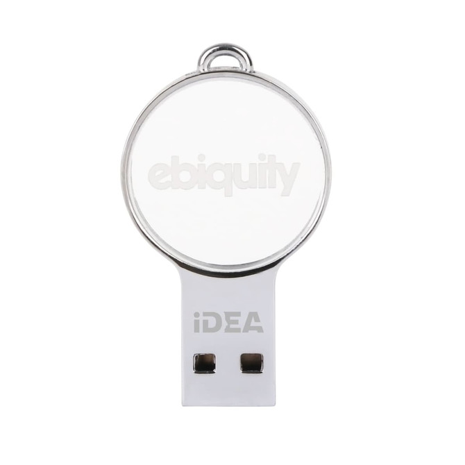 A mini round crystal flash drive in silver and clear, featuring a branding logo on its surface.