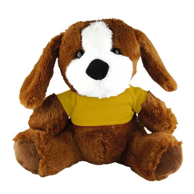 A brown plush dog wearing a yellow shirt, sitting with floppy ears and a friendly expression.