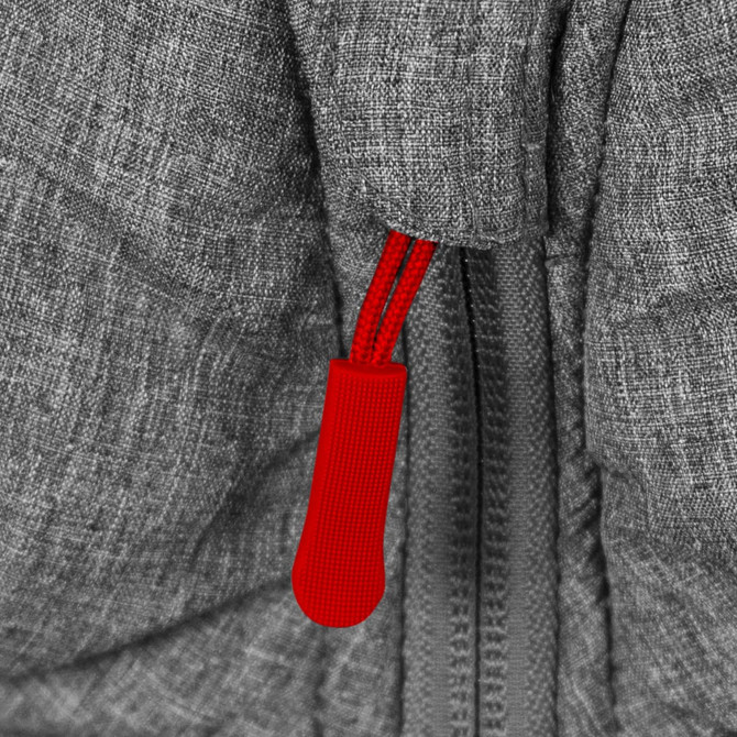 A close-up of a grey puffer jacket featuring a red zipper pull and textured fabric. The jacket has a branding logo.